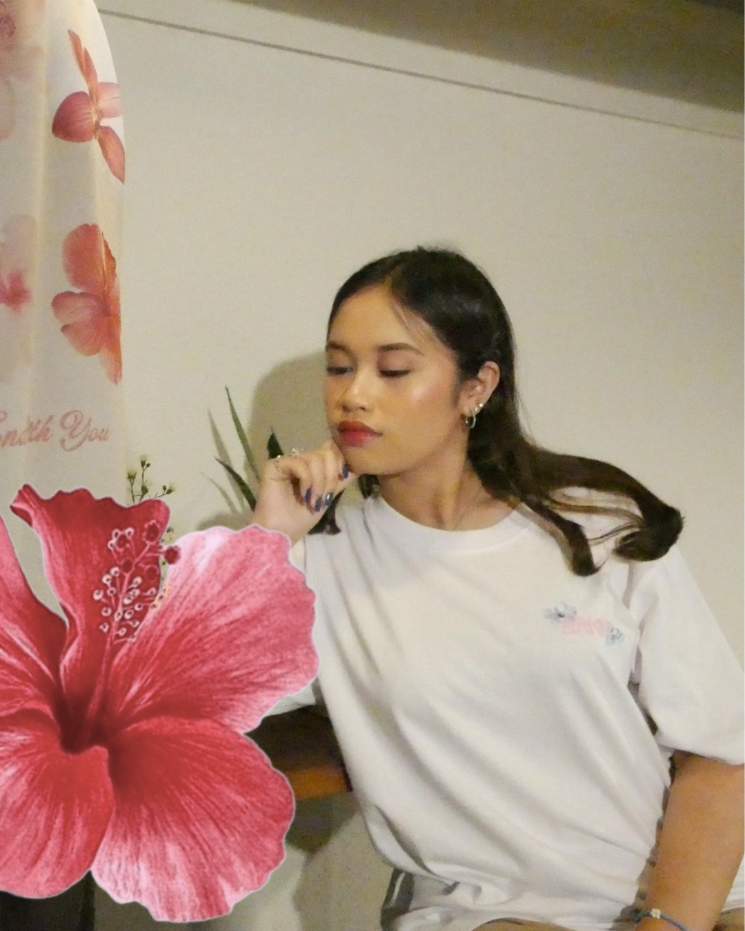 Summer collection - model wearing white t-shirt with pink floral design